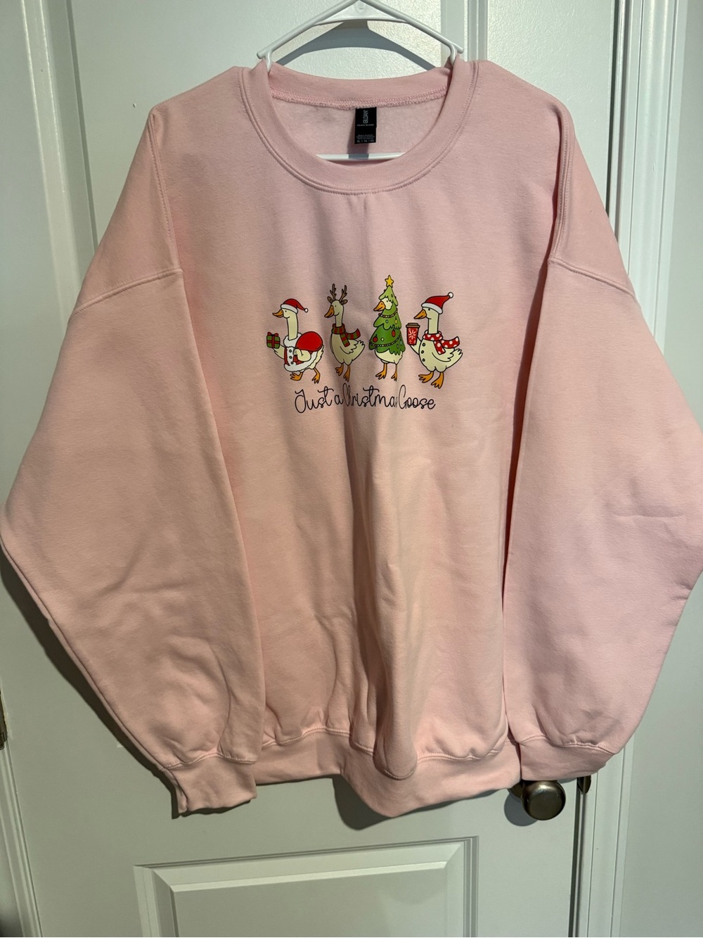 Gildan Light Pink Holiday Crewneck Sweatshirt with Festive Goose Graphic